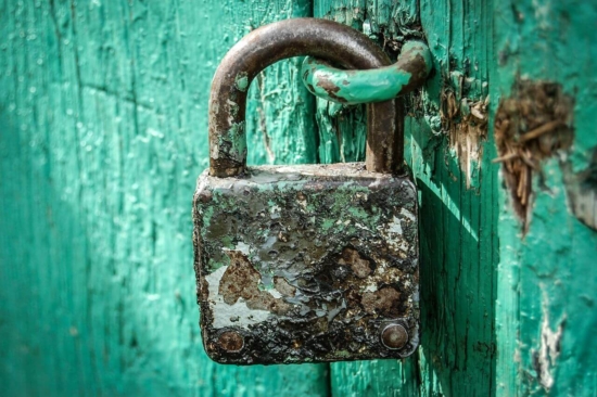 Rusty Padlock On Blue Door Rusty Padlock On Blue Door ALT
